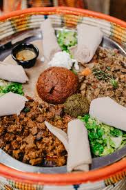 (located right in the middle of the genesee plaza shopping center at balboa and genesee. Addis Restaurant