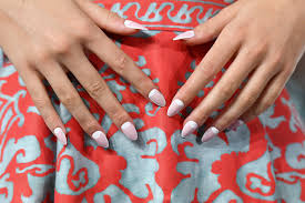 Whohas most beautiful long painted nails in world : How To Apply Fake Nails Expert Tips Allure