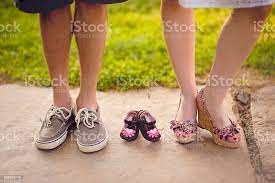 Pregnancy Announcement With Baby Shoes Stock Photo Download Image Now Istock