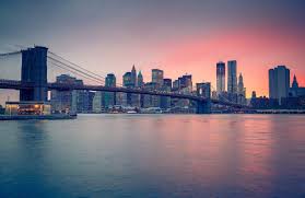 Skyscraper building under light purple cloudy sky hd new york. Sunset Over Nyc Wallpaper Mural Hovia Ie