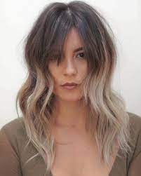 The hair is straight but a slightly messy look has been done to create a casual look about the entire hairstyle. 28 Cute Hairstyles For Medium Length Hair Right Now