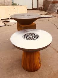 This elegant gas fire pit is lpg and ng compatible. Corten Steel Fire Pit