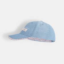 Pour plus d'information sur les délais et le processus de votre commande, consultez notre faq & conditions générales de vente. Denim Kappe Mit Gestickter Botschaft Porte Bonheur Blau Madchen Okaidi Obaibi