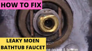 Insert an allen wrench into the rubber seat, tilting it slightly to catch the spring. Fix Leaky Moen Bathtub Faucet Free Replacement 1225 Cartridge Diy Youtube
