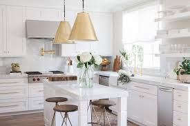 25 ways to use gold accents in the kitchen. White Kitchen With Brown And Gold Accents Transitional Kitchen