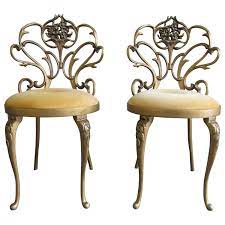 pair of cast iron hollywood regency chairs 1stdibs com arm chairs living room regency chair gold furniture