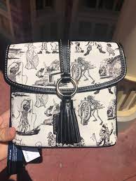 new pirates of the caribbean dooney and bourke bags spotted at magic kingdom