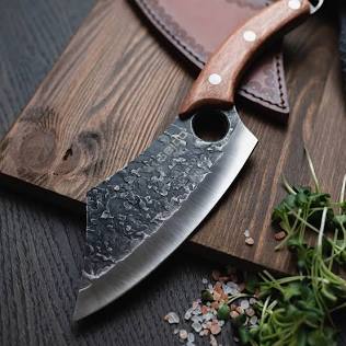 A heavy cleaver delivers the force needed for heavy breakdown., AI generated