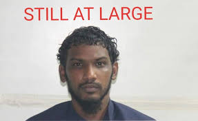 ANTHONY SEEPERSAD, ONE OF THE 5 PRISONERS WHO ESCAPED FROM THE CONVICT  PRISON AT THE GOLDEN GROVE PRISON IN AROUCA ON SUNDAY MARCH 20TH, REMAINS  ON THE RUN. HE IS CONSIDERED ARMED