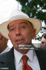 STATES, James Bert McDougal and his wife were financial partners with...  News Photo