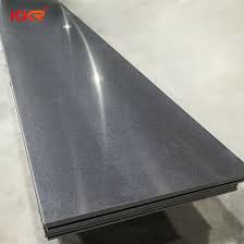 Solid surface countertops consist of mineral dust (mostly marble) mixed with a variety of plastic resins and pigments. China Black Countertop Material Slab Acrylic Solid Surface Corian China Corian Solid Surface Corian