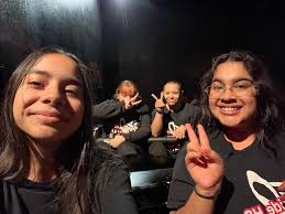 Christmas carols with students at San Antonio Airport