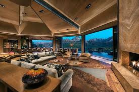 Enormous Great Room With Book Matched Slab Onyx Fireplace Octagonal Shape Luxury Living Room Luxury Interior Design Home Interior Design