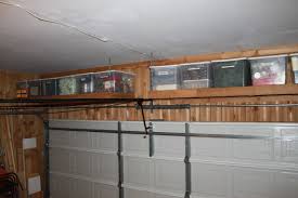 Garage storage ideas don't get more efficient than this one!! Shelves Over The Garage Door The Cavender Diary