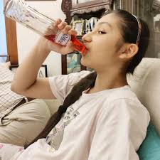 Chugging down a bottle of @pallonjis Raspberry Soda ❤️❤️