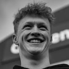 Prince Charles holds Elizabeth II's hand and escorts her in and out of  Parliament for Queen's Speech