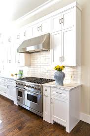 My experienced kitchen designer recommended 48 tall cabinets to take advantage of our 9 foot ceilings. Stacked Kitchen Cabinets Transitional Kitchen Hallie Henley Design