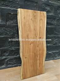 The design combines the organic curves of the acacia's live edge with the sleek, geometric form of the iron frame, forming a timeless collection that elevates any modern bedroom. Acacia Live Edge Top Dining Table Top