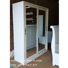 Pintu minimalis belanda merupakan pintu yang terdiri dari bagian atas dan bawah dan bisa dibuka sebagian saja, entah itu dibagian bagian atas atau bawah. Lemari Pakaian 2 Pintu Sliding Minimalis Rajajepara Com