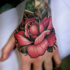 50 Amazing Tattoo Pictures Art And Design Rose Hand Tattoo Hand Tattoos Tattoos