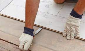 How To Replace Carpet With Laminate Flooring Hunker Removing Laminate Flooring Laminate Flooring Laminate