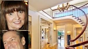 Upton Baker puts up the for sale sign