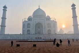 There is a domed tomb erected on an. Taj Mahal At Sunrise Gaymenonholiday Com