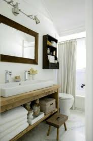This tiny bathroom is made to feel much larger by the inclusion of mirror all around the room. 16 Charming Cottage Style Bathroom Ideas Designs For 2021