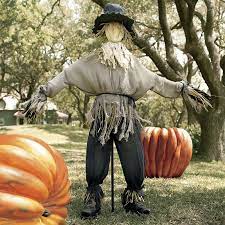 This set of 2 fall scarecrow picks is madethis set of 2 fall scarecrow picks is made of fabric and straw on a bamboo stick. Giant Lifesized Scarecrow Halloween Scarecrow Scarecrow Scarecrows For Garden