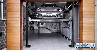 No columns sit between the two parking platforms, which keeps this tandem lift's footprint down to an astoundingly efficient 211 overall width. 5 Signs You Need A Home Garage Car Lift