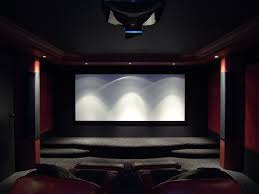 Surprised women eating popcorn in cinema. Living Room Or In Home Movie Theater Might As Well Get The Best Experience I Think I May Like M Home Cinema Room Home Theater Room Design Home Theater Rooms