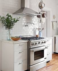 How To Clean A Stove Top Including Tough Cooked On Spills And Grease Better Homes Gardens
