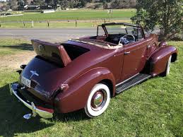 Image result for Trojan Maroon 1939 Oldsmobile
