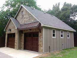 Want A Rugged And Maintenance Free House Do That A Metal Building Home With The Exception Of The Building Qualit Garage Door Design Metal Awning Garage Doors