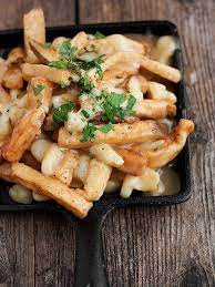 Authentic Canadian Poutine Recipe Seasons And Suppers Poutine Recipe Canadian Food Canadian Poutine