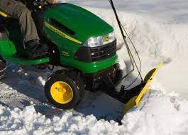Riding mower with snow plow. Turn Your Lawn Tractor Into A Snow Plow Or Blower Lawn Mower Snow Plow Tractor Snow Plow Best Riding Lawn Mower