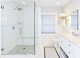 The two whites ceramic glazed subway tile is perfectly dressed up with it's compliment chair rail. Corner Walk In Shower With Chair Rail Tiles Transitional Bathroom