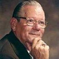 W.H. (Rusty) Komar Obituary