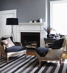 Don't be afraid to go all out, and paint the walls grey. Grey Paint Living Room Native Home Garden Design