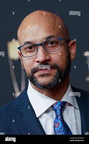 Keegan-Michael Key walking the red carpet at the NFL Honors event held at  the Fox Theatre in Atlanta, Georgia