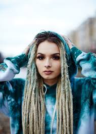 The hair stylists had twisted her blonde dreads into a bun that is half up. Hd Wallpaper Women Model Long Hair Dreadlocks Blonde Dyed Hair Young Woman Wallpaper Flare