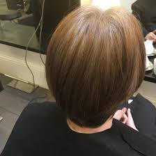 Gather top half of your hair into a sleek tight ponytail at one temple. Blonde Hair Advice How To Bleach Dark Brown Hair Safely