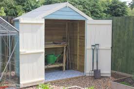 Painting your shed transforms your garden. How Does Your Garden Grow Painting A Shed To Look Like A Beach Hut