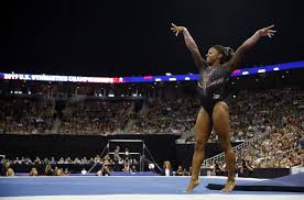 Your Pelvis Up Keeping Your Body In A Stiff Bridge Position Slowly Lower Your Body To The Floor This Co In 2020 Simone Biles Gymnastics Championships Usa Gymnastics