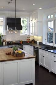 White Cabinets Black Granite Countertops Kitchen Renovation Inspiration Kitchen Renovation Kitchen Inspirations Green kitchen cabinets may be bold, but they're not too bold to pair with other colors.