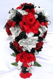 Select a suit that showcases the groom's personality and pair fill your city wedding with soft natural touches like a unique white bouquet filled with dried grains and feathery flowers. Trendy Flowers Red Black Bridal Bouquets 21 Ideas