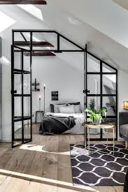 Black And White Interior Design Modern Attic Apartment With An Industrial Glass Wall Gravity Home Modern Studio Apartment Ideas Home Bedroom Bedroom Interior