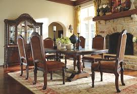 Inspired by the grandeur and grace of old world traditional style, the north shore dining room buffet and china cabinet are nothing short of stunning. North Shore Dining Room Chair By Millennium By Ashley Drkch3w09540 Missouri Furniture