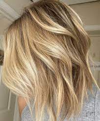 The trick to wearing this look on fine hair is adding a point of interest over your elastics. 50 No Fail Medium Length Hairstyles For Thin Hair Hair Adviser