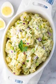 I don't like chopped boiled eggs in potato salad so i developed this recipe using pickles and pickle juice for tang! Easy All American Potato Salad Recipe Jessica Gavin